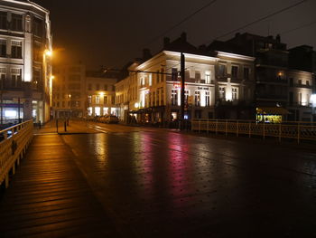 Wet street at night