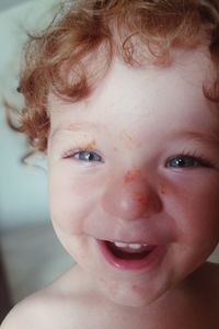 Close-up portrait of smiling boy