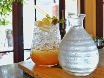 Close-up of drink in glass jar on table