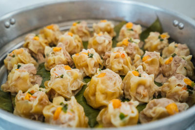 High angle view of meat in cooking pan