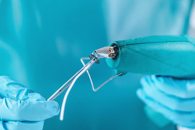 Close-up of insect on blue background