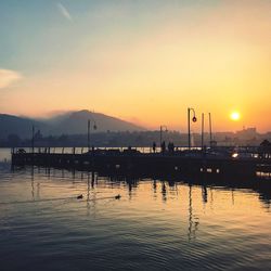 Silhouette of marina at sunset