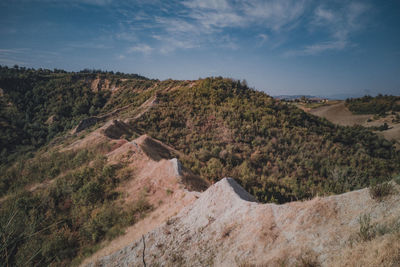 Scenic view of land against sky