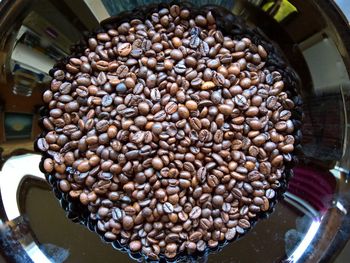 Close-up of coffee beans on table