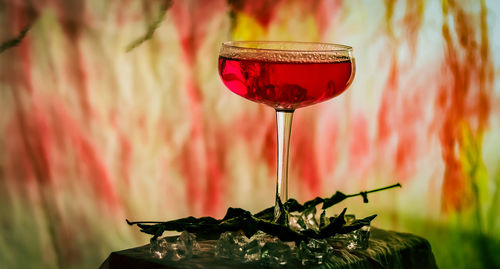 Close-up of wineglass on table