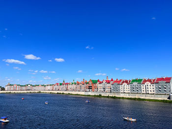 Scenic view of sea against blue sky