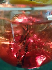 Close-up of red wine in water
