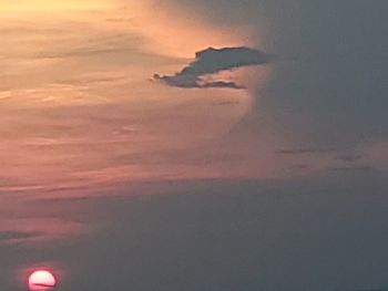 Low angle view of dramatic sky during sunset