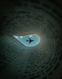 High angle view of person flying over water