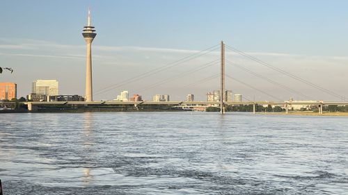 View of bridge over river in city