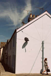 Low angle view of man against sky