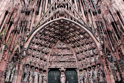 Full frame shot of sculptures on cathedral entrance