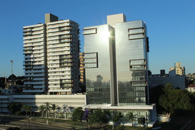 Buildings against blue sky