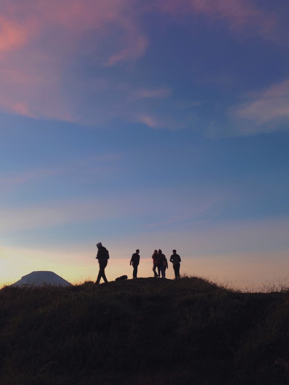 men, silhouette, leisure activity, lifestyles, togetherness, sky, landscape, person, tranquility, tranquil scene, friendship, nature, beauty in nature, scenics, mountain, field, bonding