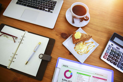 High angle view of coffee cup on table