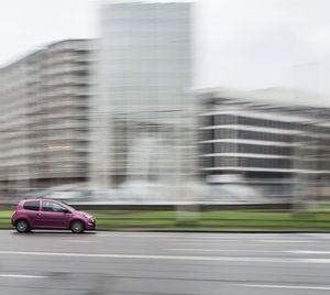 Blurred motion of car on road