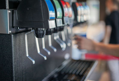 Close-up of soda fountain in restaurant