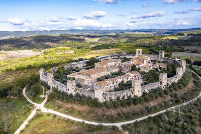 Italy, tuscany, monteriggioni, aerial view of medieval walled village