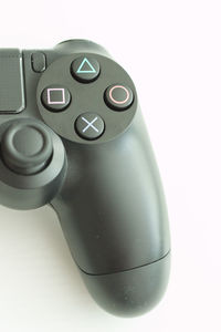 Close-up of camera over white background