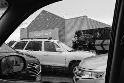 Cars on road seen through window