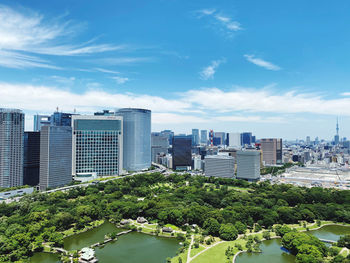 Buildings in city against sky