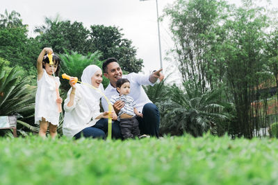 Parents with children at park