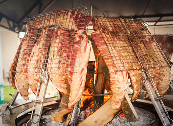 Close-up of meat on barbecue grill