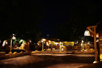 Illuminated street at night