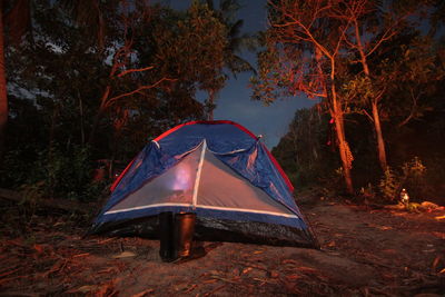 Outdoor activities camping with firewor, stars and moon light