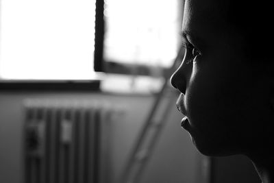 Close-up of boy looking away