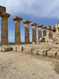 Old ruins of temple against sky