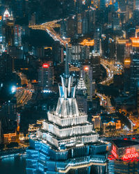 High angle view of illuminated cityscape at night