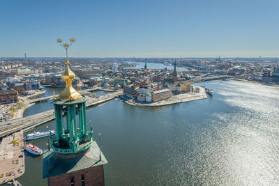 Stockholm city hall roof and golden crowns on the top. sweden. drone point of view