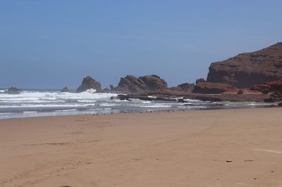 Scenic view of beach against sky