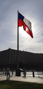 Low angle view of buildings in city against sky