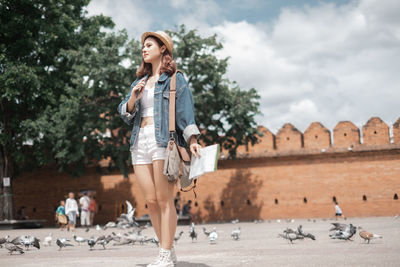 Young woman looking away outdoors