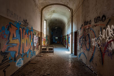 Graffiti on wall in abandoned building