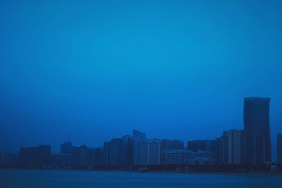 View of cityscape against clear sky