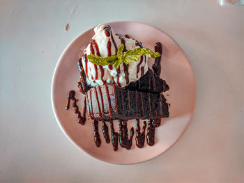 Close-up of cake served on table