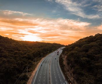 Road against sky during sunset