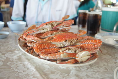 Close-up of fish in plate on table