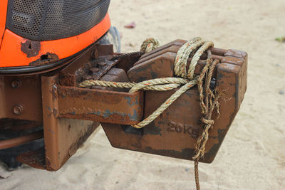 High angle view of rope tied on metal