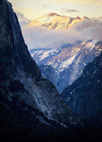 Aerial view of mountains against sky during sunset