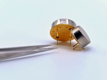 High angle view of electric lamp on table against white background