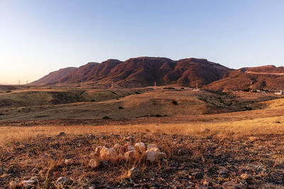 Scenic view of rocky mountains against clear sky