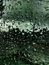 Close-up of water drops on glass