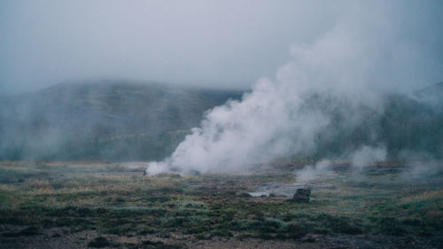 Smoke emitting from volcanic mountain