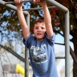 Boy playing on playground