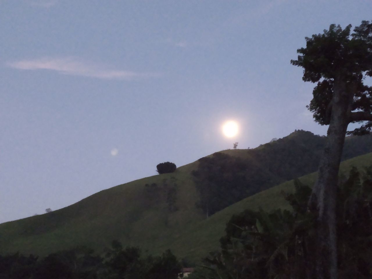 SCENIC VIEW OF MOUNTAINS AGAINST SKY AT SUNSET