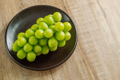 High angle view of fruits in bowl on table